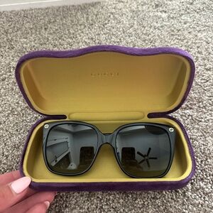 Gucci sunglasses  Gucci GG0022S Frame Tinted Sunglasses in Black